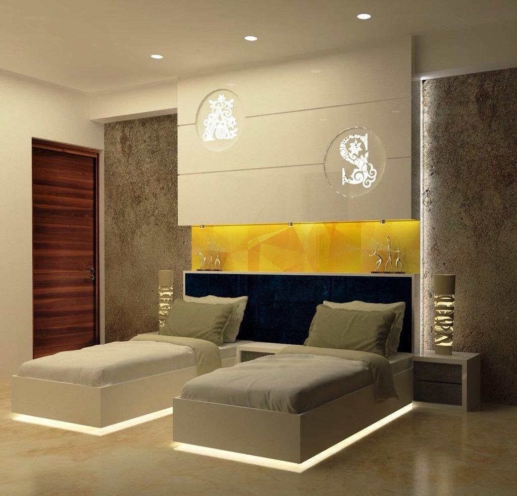 Pooja room with carved detailing and warm light